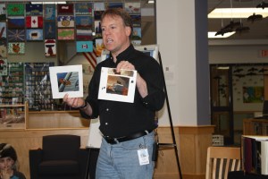 Brian Lies shows first copies of illustrations for book